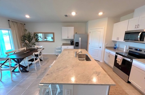 New Smyrna Beach House | Coast To Coast- 4BR/2BA- Near Ocean-Pool-Close to Flagler Ave-Canal St.