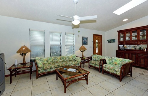 Indian River Estates House | Coastal Comfort Retreat - Pet-Friendly Paradise w/Fenced Yard, Fire Pit & Lanai