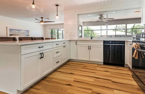 Shell Harbor House | Coastal Cottage on Canal, East End with Pool