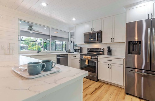 Shell Harbor House | Coastal Cottage on Canal, East End with Pool