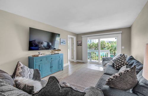 Villa Sabine Condo | 🌅Community Pool-Walk 2 Beach-Covered Balcony-Pier-2BR Deepwater Cove 103🌅