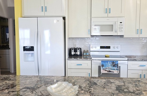 Villa Primera House | Completely renovated house. Lots of fun bright colors & right by the beach!