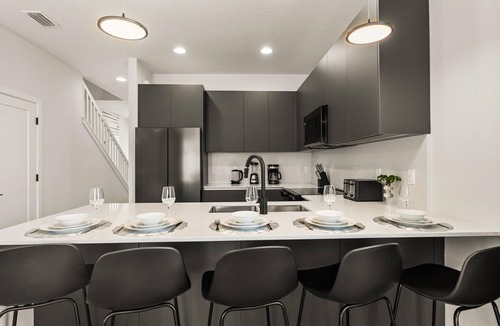 Four Corners Villa | Contemporary 4BR Townhome With Pool & Themed Rooms