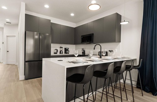 Four Corners Villa | Contemporary 4BR Townhome With Pool & Themed Rooms
