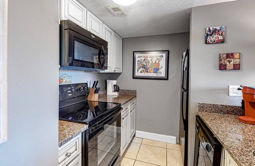 Orange Beach Condo | Cozy Beach Condo with Private Beach, heated pool, High Speed WiFi, and More.