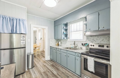 South Pensacola House | Cozy Bungalow near Downtown Pensacola: Game Room, Patio + Fire Pit, 3 Bedroom!