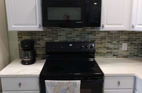 Indian Shores Condo | Cozy Coastal Condo, renovated 2025, quiet family friendly, fishing from seawall