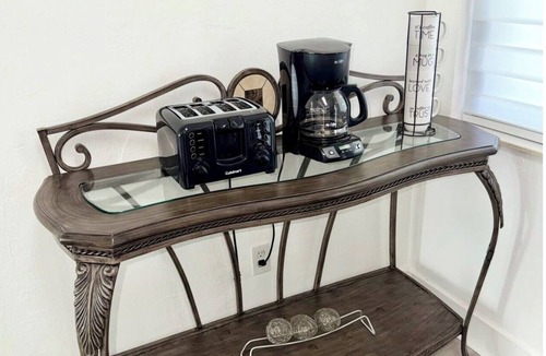 Kendall House | Cozy two bedroom Miami home with private parking at your front door.