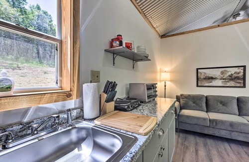 East Tallassee Cabin | Creekside Cabin Retreat w/Community Fire Pit