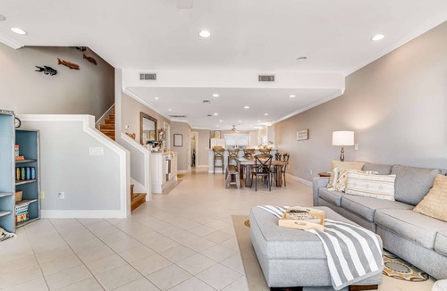 White Sands Condo | Dog-friendly, beachfront dream with a wet bar & two furnished balconies