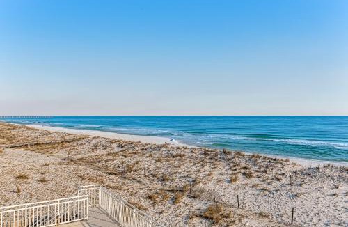 White Sands House | Dog-friendly beachfront dream with a wet bar & two furnished balconies