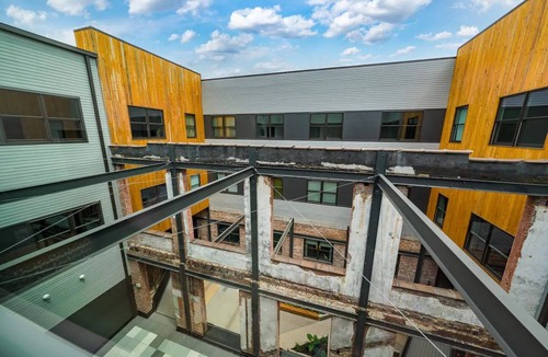 Central City Condo | Downtown Luxe Industrial Loft in Mercantile on Morris! Free parking! Dogs ok.