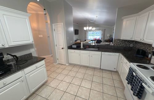 Beachwalk Isles House | Enjoy amazing sunsets over the lake with private, heated pool. Quiet subdivision