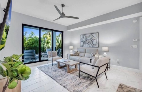 Redevelopment Area Condo | Experience true luxury with this chic and modern condo in Naples.