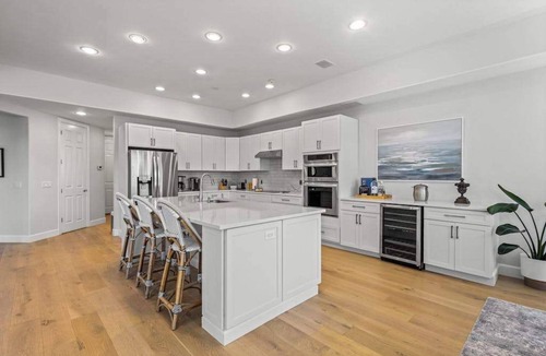 Vanderbilt Beach House | Exquisite waterfront home with lanai, heated pool and spa(hot tub), and internet