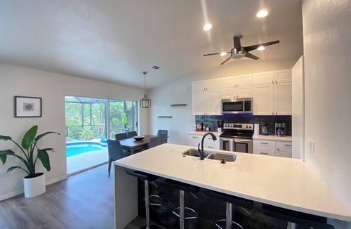 Long Meadow House | Fabulous 3 BR & 3 BA canal house with heated pool near Boca Grande