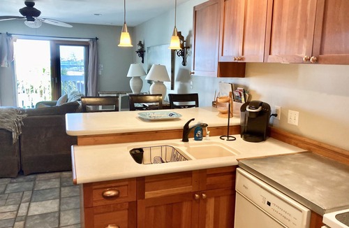 Ono Island Condo | Family Friendly & Quiet Riverside Condo with Pool & Fishing Piers