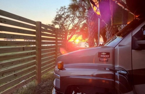 Florida Panhandle RV Rental | Florida Waterfront RV site on the eastern shore of Escambia Bay Endless Sunsets.