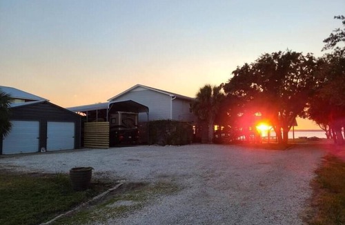 Florida Panhandle RV Rental | Florida Waterfront RV site on the eastern shore of Escambia Bay Endless Sunsets.