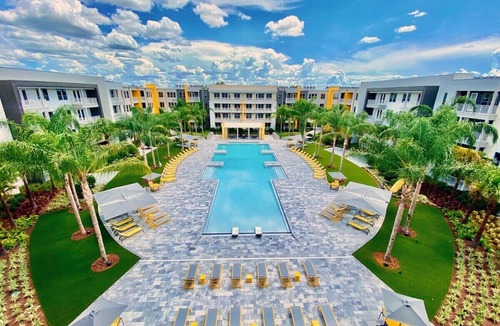 Deerwood Apartment | Fusion 1406 · Top floor modern getaway w/resort amenities!