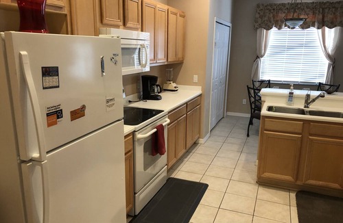 West Haven House | GATED COMMUNITY CHAMPIONS GATE AREA: 6 Bedroom Home/Pool/Spa/Covered Lanai