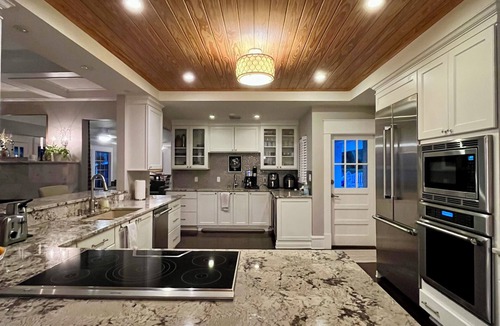 Edgewood House | Gated Lakefront Estate,Central Location on an acre with Boat ramp, and more