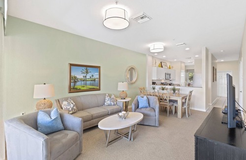 Naples Condo | Genoa Vacation Rental: Stylish 2-BR Condo with Golf & Lake Views. Resort-Style Pool, Hot Tub, and Easy Access to Championship Golf. Minutes from Naples Beaches, 5th Avenue S, and Marco Island