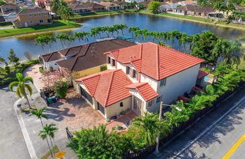 Tamiami Villa | Glow Lakefront Villa, Heated Pool - Spa, 4K Cinema