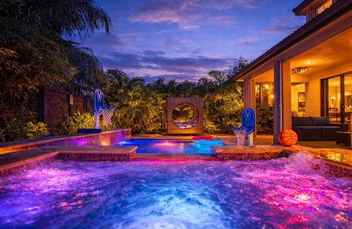 Tamiami Villa | Glow Lakefront Villa, Heated Pool - Spa, 4K Cinema