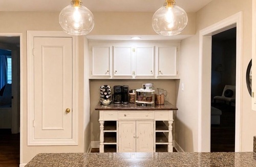 Daphne House | Grand Oak Cottage in Olde Town, 2 King Primary Suites, year round Saltwater Pool