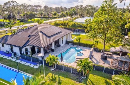 Hunt Club Villa | Grand Palm Villa Resort concept Pool Piano Sports Court