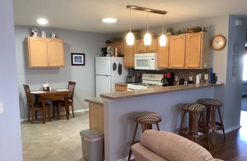 Liberty Park Villa | Great Location! 2 Bdrm villa with GAS GOLF CART, BBQ & FREE WiFi included!
