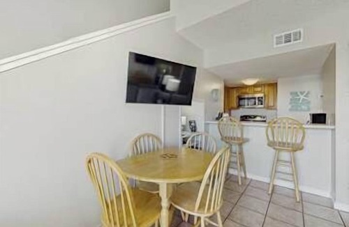 Orange Beach Apartment | Gulf front condo with onsite snack bar, three shared pools, and internet