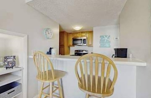 Orange Beach Apartment | Gulf front condo with onsite snack bar, three shared pools, and internet