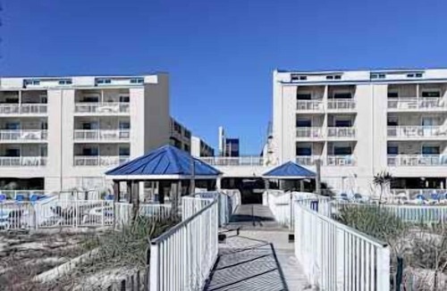 Orange Beach Apartment | Gulf front condo with onsite snack bar, three shared pools, and internet