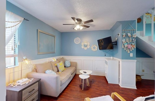 Holiday Beach House | Gulf view 2 story condo near the beach with porch streaming laundry and central AC