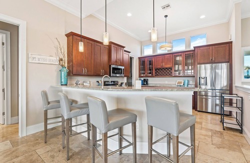 Mid Island House | Heated Pool- Dock- Pet Friendly- 4BR Sandy Getaway