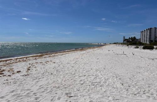 Laguna Shores Apartment | Heated Pool Home steps to the beach