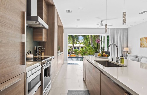 Wilton Manors House | Heated Pool, Modern Spacious Waterway Home Offering Comfort, Style & Total Relaxation!