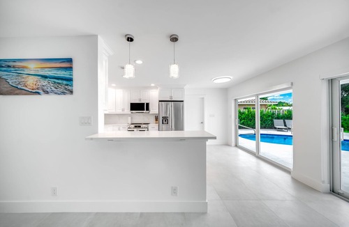 Coral Ridge Isles House | Heated Pool+Waterfront! Close 2 Beach+Restaurants!