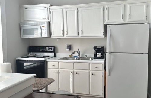 Central Business District Apartment | Historic 1800s Dauphin Street Loft - Above Iconic 109-Year-Old Candy Shop