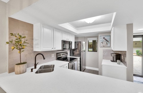 Bonita Bay Condo | Incredible Private Beach Club with shuttle. Beautiful Condo in gated Bonita Bay