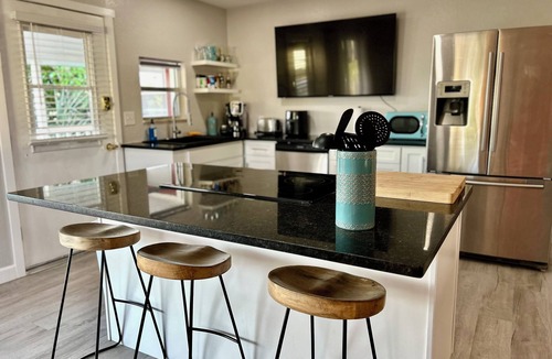 Pine Island Center Apartment | Island Home: 3-bedroom apartment in Bokeelia with hot tub, AC, water views, bbq