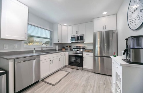 Mid Island House | Island Homes-on canal w/dock and heated pool/5 min walk to beach