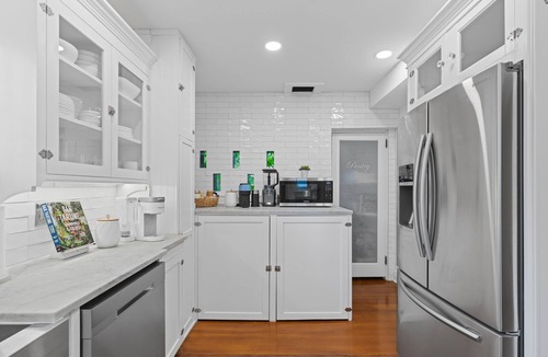 Sunshine Park House | July Special! Luxury and Historic Elegance in a Charming West Palm Beach Villa.
