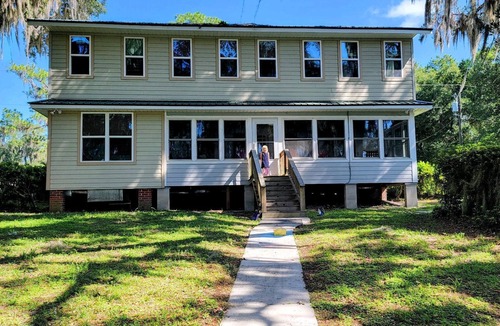 Starke House | Kingsley Lake Home w wide lawn, dock, central air, 4 kayaks. Near Camp Blanding