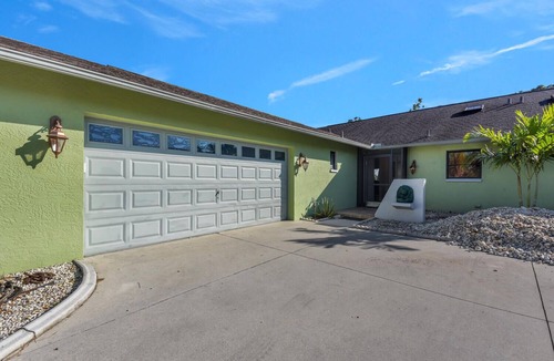 Lochmoor Waterway Estates Villa | Littlestone Villa updated 2-bedroom duplex with spa looking out to wilderness