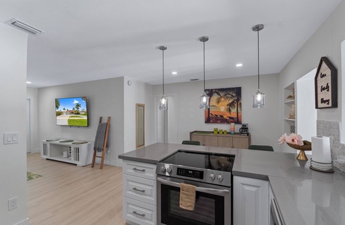 Garden Isles House | Luxurious Waterfront Ocean Access Heated Pool WD Wifi 75Ft Dock Bring Your Boat
