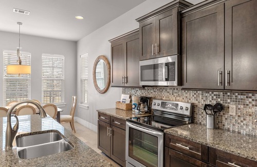 Villa Lago House | Luxury 4BR Villa Lago w/6-Seat GOLF CART! Near Village, Pool, Tram Included!