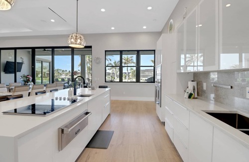 Pelican House | Luxury Cape Coral Estate | Stunning Waterfront | Saltwater Lagoon Pool, Spa & Sprawling Sun Deck